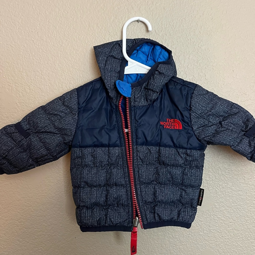 The North Face Baby Puffer Jacket reversible- Navy and Red